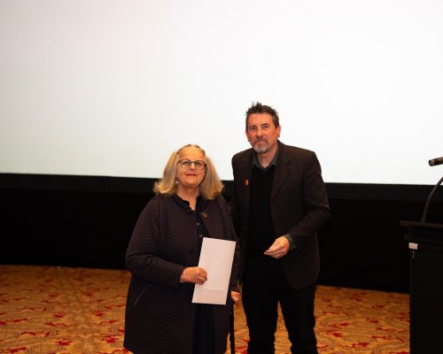 Winner of the Oral History Excellence Award for 2026, Birutė Beal, with HCSA President, Prof. Matthew Fitzpatrick.
